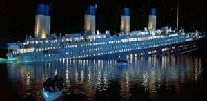 Titanic - o navio afundando e gente ainda em luta, para manter o lugar à mesa, próximo da orquestra.